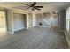 Spacious living room featuring hardwood floors and a ceiling fan at 3463 Lake Shore S Dr, Denver, NC 28037