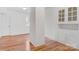 Hardwood floors and built-in shelving in this bedroom at 357 7Th Nw St, Hickory, NC 28601