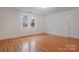 Spacious bedroom featuring hardwood floors and ample natural light at 357 7Th Nw St, Hickory, NC 28601