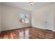 Bright bedroom with hardwood floors and large windows at 357 7Th Nw St, Hickory, NC 28601