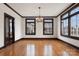 Spacious dining room with hardwood floors, large windows and chandelier at 357 7Th Nw St, Hickory, NC 28601