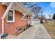 Brick house exterior showcasing a side view and driveway at 357 7Th Nw St, Hickory, NC 28601