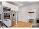 Bright kitchen featuring stainless steel appliances and hardwood floors at 357 7Th Nw St, Hickory, NC 28601