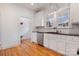 Modern kitchen with stainless steel appliances and white cabinets at 357 7Th Nw St, Hickory, NC 28601