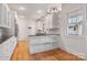 Updated kitchen, featuring stainless steel appliances and an island at 357 7Th Nw St, Hickory, NC 28601