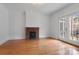 Living room with fireplace and French doors leading to deck at 357 7Th Nw St, Hickory, NC 28601