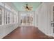 Sunroom with terracotta tile floor and access to backyard at 357 7Th Nw St, Hickory, NC 28601