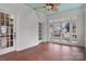 Sunroom features terracotta tile floor, and multiple windows at 357 7Th Nw St, Hickory, NC 28601