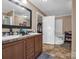 Double vanity bathroom with soaking tub and walk-in closet at 3717 Elliott Cemetary Rd, Shelby, NC 28150