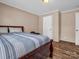 Guest bedroom with wood floors and a full-size bed at 3717 Elliott Cemetary Rd, Shelby, NC 28150