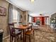 Cozy dining area with a wooden table and bench seating at 3717 Elliott Cemetary Rd, Shelby, NC 28150