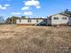 Back of house showing large yard and detached garage at 3717 Elliott Cemetary Rd, Shelby, NC 28150