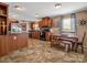 Kitchen with wood cabinets, tile floor and an island at 3717 Elliott Cemetary Rd, Shelby, NC 28150