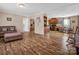 Open concept kitchen and living area with wood flooring and ample cabinet space at 3717 Elliott Cemetary Rd, Shelby, NC 28150