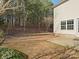 View of the spacious backyard featuring mature trees and room to roam at 3865 Parkers Ferry Rd, Fort Mill, SC 29715