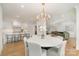 Bright dining room with marble table and kitchen views at 3935 Black Sycamore Dr, Charlotte, NC 28226