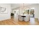 Modern dining room with a round table and chandelier at 3935 Black Sycamore Dr, Charlotte, NC 28226