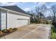 Attached garage with spacious concrete driveway at 3935 Black Sycamore Dr, Charlotte, NC 28226