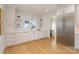 White kitchen with geometric backsplash and stainless steel appliances at 3935 Black Sycamore Dr, Charlotte, NC 28226