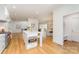 Open concept kitchen with island and built-in microwave at 3935 Black Sycamore Dr, Charlotte, NC 28226