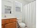 Full bathroom featuring a toilet, shower, and vanity at 4152 Broadstairs Sw Dr, Concord, NC 28025