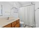 Clean bathroom with shower/tub combo, vanity, and toilet at 4152 Broadstairs Sw Dr, Concord, NC 28025