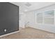 Bright hallway with carpeted floors and a baby gate at 4152 Broadstairs Sw Dr, Concord, NC 28025