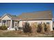 Landscaped backyard with patio and screened porch at 417 Spring Arbor Ave, Salisbury, NC 28146