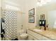 Clean bathroom, granite countertop, shower/tub combo at 417 Spring Arbor Ave, Salisbury, NC 28146