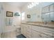 Bathroom boasts double sinks, granite countertops, and a shower at 417 Spring Arbor Ave, Salisbury, NC 28146