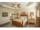 Bright bedroom with ensuite bathroom access and hardwood floors at 417 Spring Arbor Ave, Salisbury, NC 28146