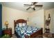 Serene bedroom with a ceiling fan and double-door closet at 417 Spring Arbor Ave, Salisbury, NC 28146