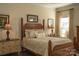 Charming bedroom featuring a wooden bed frame and hardwood floors at 417 Spring Arbor Ave, Salisbury, NC 28146