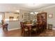 Elegant dining room with hardwood floors and a large wooden table at 417 Spring Arbor Ave, Salisbury, NC 28146