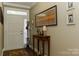 Bright and spacious entryway with hardwood floors and decorative wall art at 417 Spring Arbor Ave, Salisbury, NC 28146