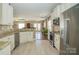 Spacious kitchen with granite countertops, stainless steel appliances, and an island at 417 Spring Arbor Ave, Salisbury, NC 28146