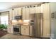 Kitchen with stainless steel appliances and light colored cabinets at 417 Spring Arbor Ave, Salisbury, NC 28146