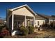 Relaxing screened porch with patio furniture and landscaping at 417 Spring Arbor Ave, Salisbury, NC 28146