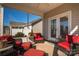 Relaxing screened porch with red seating at 417 Spring Arbor Ave, Salisbury, NC 28146