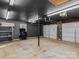 Spacious garage with ample storage shelving and overhead door at 4532 Oakwood Cir, Gastonia, NC 28056