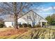 House exterior view, showcasing a fenced backyard and landscaping at 4855 Star Hill Ln, Charlotte, NC 28214