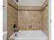 Bathroom with shower/tub combo and tile surround at 4855 Star Hill Ln, Charlotte, NC 28214