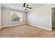 Bedroom with carpet, ceiling fan, and window at 4855 Star Hill Ln, Charlotte, NC 28214