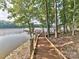 Scenic boardwalk path leading to lakefront docks at 4855 Star Hill Ln, Charlotte, NC 28214