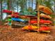 Outdoor rack with colorful canoes and kayaks at 4855 Star Hill Ln, Charlotte, NC 28214