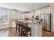 Eat-in kitchen with island seating and stainless steel appliances at 4855 Star Hill Ln, Charlotte, NC 28214