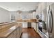 Modern kitchen boasts stainless steel appliances and granite countertops at 4855 Star Hill Ln, Charlotte, NC 28214