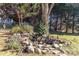 Landscaped backyard with a charming water feature at 4855 Star Hill Ln, Charlotte, NC 28214