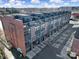 Modern townhome complex features a rooftop terrace and private garages at 544 New Bern Station Ct, Charlotte, NC 28209