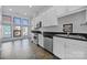 Well-equipped kitchen featuring stainless steel appliances, sleek black countertops, and ample cabinet space at 544 New Bern Station Ct, Charlotte, NC 28209